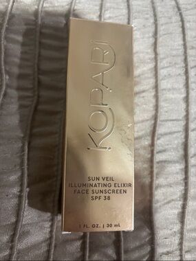 Kopari Illuminating Elixir Face Sunscreen - Metallic Gold Packaging